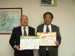 猪股教育長（左）と久野社長（右）